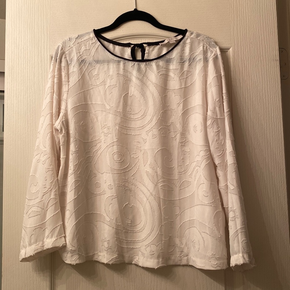 Embossed Cream blouse with black trim